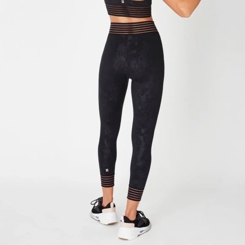 Sweaty Betty Embossed Patterned Black/Navy Leggings with Sheer Striped Trim